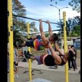 This Duo's Display Of Body Strength Easily Doubles Up As A Playground Magic Trick