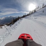 Sledding Down Snowy Swiss Slopes Looks Like A Meditative Experience