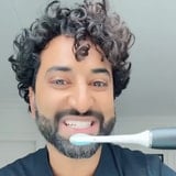 How To Properly Use Your Electric Toothbrush, According To A Dentist