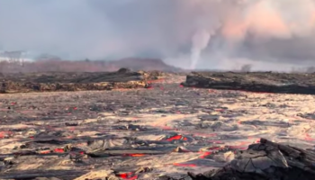 The Very Surreal Sight Of A River Of Lava Rushing To Sea