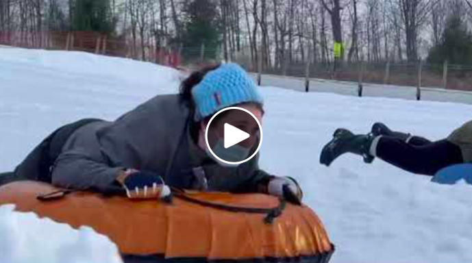 This Guy Should Receive An Award For Cinematographer Of The Year For His Capturing Of People Tubing Down A Hill