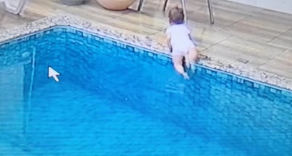 Here's Crazy Footage Of A Dad Leaping Into A Pool To Save His Drowning Baby