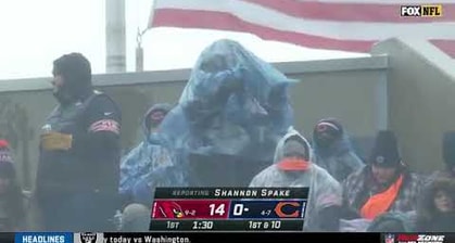 Chicago Bears Fan Struggles, Fails To Put On Poncho As Chicago Bears Struggle, Fail To Beat The Arizona Cardinals At Home